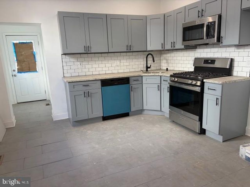 Photo of 1811 E Airdrie Street, PHILADELPHIA, PA 19124 (MLS # PAPH2582384)