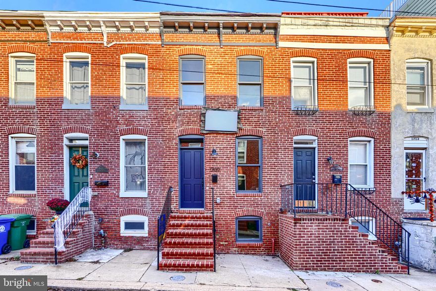 Welcome to 1709 William Street, a beautifully renovated Federal Hill home by New Renaissance that blends classic Baltimore charm with modern design. The open main level features exposed brick, hardwood floors, and a seamless flow from the living and dining areas into a bright, well-equipped kitchen with stainless steel appliances, and a convenient main-level laundry. Upstairs, you’ll find a spacious primary along with an additional bedroom and full bath perfect for guests. The finished basement offers a versatile room, full bath, and plenty of storage, making it a great spot for additional bedroom, media room, office. The rooftop deck is a true highlight, offering views of the Patapsco River and the city skyline. This home qualifies for a 10-year CHAP tax credit, saving the new owner close to $50,000 over the life of the loan.  Don't miss out on this opportunity.