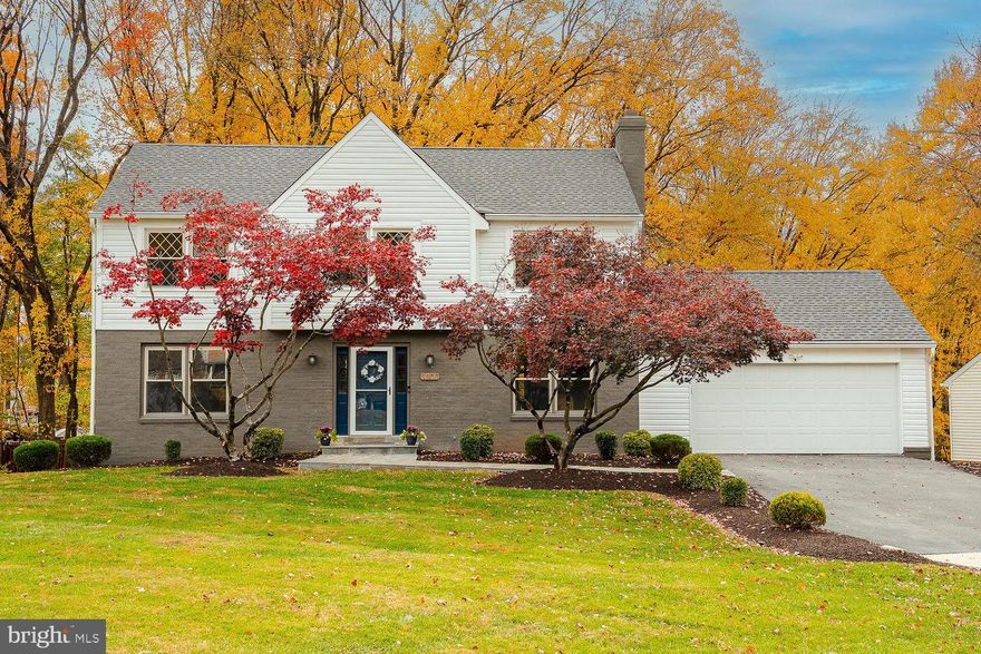 Backed by a lush expanse of protected woods, 3800 Cherry Valley Drive delivers the rare Olney trifecta: privacy, space, and a top-to-bottom renovation. This turnkey home, fully renovated 2021-2025, sits on a half-acre corner lot and immediately impresses with bright, updated interiors, three generous living spaces, and a sleek, modern kitchen that opens to a fantastic new deck - your front-row seat to peaceful, tree-lined views. The main level features a beautiful family room with wood burning fireplace and dramatic coffered ceilings, a formal living room, powder room and two dining spaces plus casual bar seating.

Upstairs, the refreshed bedroom level includes a comfortable primary suite with a beautifully redone bathroom with double sinks and walk-in closet, three additional bedrooms and an additional renovated full hall bath. The walk-out lower level adds true flexibility with a third living area, full bath, and guest bedroom - perfect for movie nights, in-laws, or work-from-home. A large storage room completes the floor.

A two car garage, great curb appeal, and that unbeatable wooded backdrop seal the deal. All of this sits in one of Olney's favorite communities, close to the theater, golf course, parks, swimming, dining, shopping, and commuter routes. Move-in ready, beautifully updated, and perfectly placed - this is Olney living at its best.