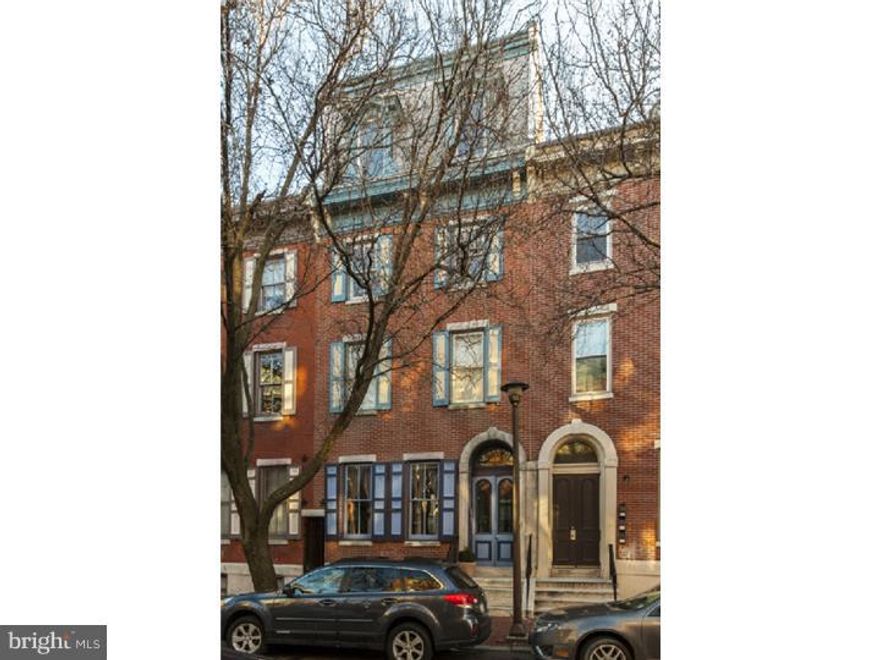 In the heart of the Art Museum District. This Unique condominium comprises two floors of an 1860s townhouse with three living levels located on the 3rd and 4th floors. Approximately 1700 square feet, with three bedrooms and two full baths, this open, airy living space features a large, dramatic living room with 20-foot ceilings, wood floors. wood-burning fireplace and windows that look out onto flowering pear trees. Updated kitchen with Corian counters, all new stainless steel appliances: electric range, microwave, dishwasher, refrigerator and a full-size washer and dryer. One bedroom with windows on three sides and generous closets, a second bedroom currently used as a "media room". The third bedroom, with hardwood floors has a wall of windows that look out across the city skyline and a door out to a new bi-level deck. A Jack-and-Jill bathroom with subway tile and travertine floor is on the main floor. A second bathroom with subway tiles and stone floor off 3rd bedroom on the top floor. A brand new cedar deck with a hose bib, multiple electrical outlets and four large fiberglass planters (included) has fabulous views of the city skyline. Upgrades include all new energy-efficient, tilt-in windows with honeycomb shades. All window sills replaced. Rebuilt existing closets. Replaced hot water heater. Upgraded plumbing. Upgraded kitchen cabinets and replaced all appliances (range, microwave, dishwasher, refrigerator, washer and dryer). Installed new, wall-to-wall carpeting in bedrooms and stairways. Added indirect lighting throughout the condo, upgraded electric improvements + added "theatre" lighting for art collection. Installed new Altus ceiling fans. Easy access to Routes 76 and 95. A stone's throw from the Barnes Foundation, the Rodin Museum, the Philadelphia Museum of Art, Kelly Drive and Boathouse Row on the banks of the Schuylkill River. Close to University of Pennsylvania, Drexel University and Temple University.