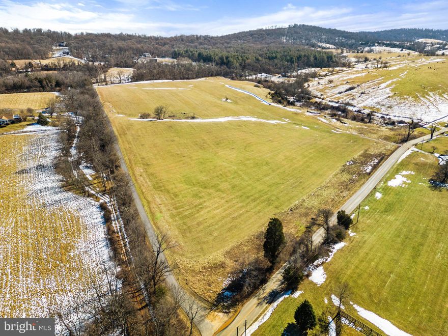 Build your dream home here. This gorgeous lot is 30.21 acres and zoned AR1 with No HOA or conservation easement.  Run your agricultural business, build a home or subdivide into two lots. There are many options.  Open land with gentle slopes and panoramic views.  Fantastic Leesburg location close to the historic Village of Waterford. Enjoy nearby antiques stores, shopping, wineries and restaurants.  Property is in  County land use (hay and open space). Seller not responsible for rollback taxes. Covenant applies that may be amendd