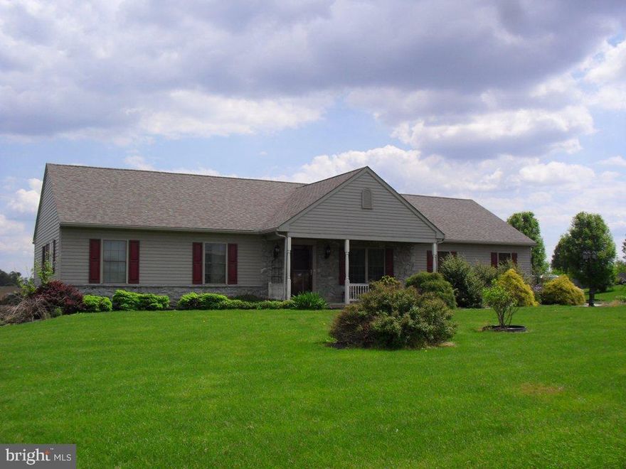 Custom built ranch home by Metzler Home Builders on big level lot. Open floor plan with country kitchen to living room with cathedral ceiling, fireplace and built in book shelves. Beautiful sun room overlooking farmland. Family room in basement. Full bathroom in basement. Partially finished bedroom or office in basement.