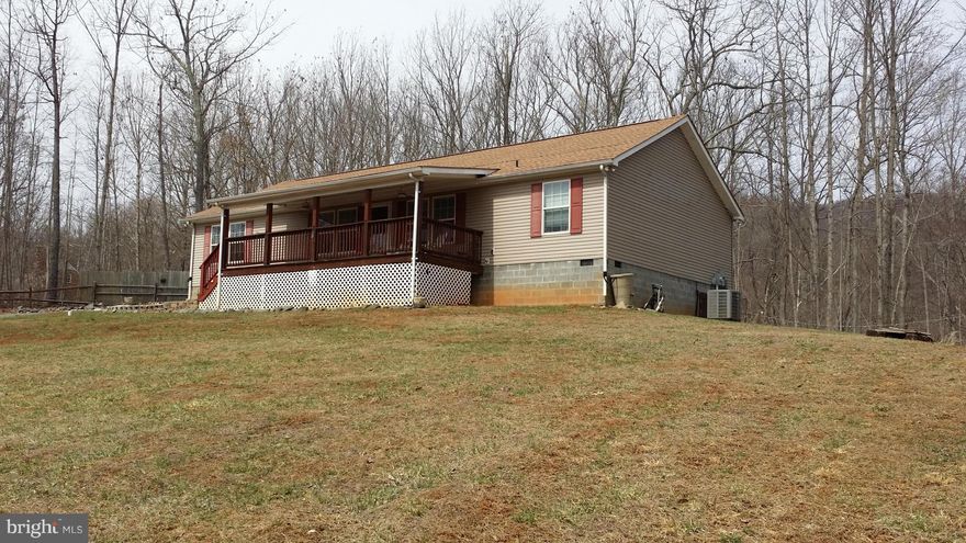 Country living on over 10 acres in Madison county with fruit orchard, garden , fenced pasture for animals,  ,stocked pond, stream, ,3 outbuildings, 2 with water, 1 with electric,  coi pond, above grade pool, home has tankless water heater  heat pump with digital thermostat,  3 bedrooms with bonus room, living room, dining room, mud room, computer area, 2 pantries,  linen closet don't miss this one