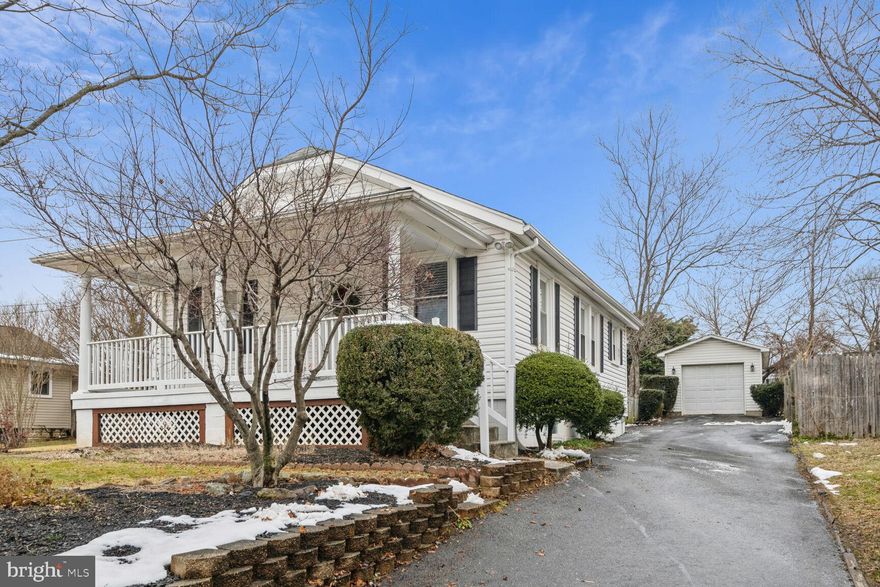 Great Location!!  Very Convenient to Rt 1, 200/ICC, 495 & 95.  Walking distance to Costco as well as multiple other stores,  and a wide variety of restaurants for the best dining experiences!!   This adorable detached home is a shotgun style rancher sometimes called a cape cod/bungalow.  Either way it is quaint and has some nice upgrades. Not to mention it sits up on a slight hill so the front porch offers a great vantage point for watching the world go by and any day is a good day for sitting on the front porch!  Unless you need the privacy of the back porch!  The back porch is screened in and over looks the yard which is fenced as well as surrounded by tall evergreens.  
The main level has the original hardwood floors,  2 bedrooms and 1 full bath, as well as a cozy living room and separate dining room. There is attic space for storage the access is in the hall between the bedrooms.  The kitchen is at the back of the house where you can find the staircase to the basement as well as the back exit door.   The basement offers a recreation area with kitchenette/bar,  2 rooms,  a full bath and the laundry area.  The rooms are currently being used as a bedroom and an office.   This layout could also be a perfect apartment for a teenager or guests.   This home and its price point makes for an excellent  starter home and we all know it will not last long.   Offers will be reviewed  as they come in