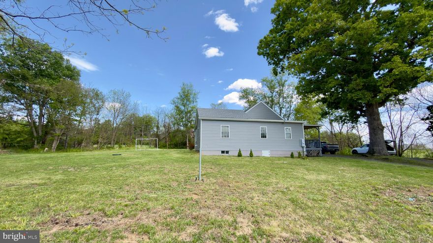 Charming bungalow situated on over 2 private acres in the heart of Berryville, offering a rare opportunity to enjoy peaceful rural living with endless potential. Surrounded by mature trees and open space, this property provides the privacy and natural setting buyers are looking for.
This 2-bedroom, 1-bath home features over 1,000 square feet of single-level living, including a spacious living room, separate dining area, and a generously sized kitchen. Both bedrooms are well-proportioned, and the home offers convenient main-level living throughout. it also provides a den in a lower level!
The expansive lot—over 2 acres—backs to trees and offers a mix of cleared and wooded areas, ideal for outdoor enjoyment, gardening, or future expansion. With no HOA and plenty of space for parking, this property is perfect for those seeking flexibility and room to grow.
Served by well and septic, and located in a quiet rural setting, yet still within close proximity to town amenities, commuter routes, and local attractions.
Whether you’re looking for a primary residence, weekend retreat, or investment opportunity, this property offers exceptional value and potential in desirable Clarke County.