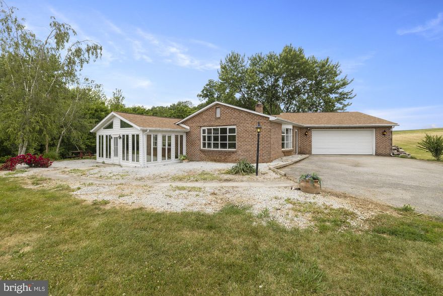 This is an 89 plus acre farm with the original farmhouse having 4 bedrooms 1 bath rental, 2 mobile home rentals, and the owners home with 2 bedrooms and 2 baths sitting on an approximately 3 acre pond with picturesque views.  There is also a detached  30x 48 two car garage with power.  There are currently approximately 48 acres under till and with some drainage work, that could possibly be expanded.