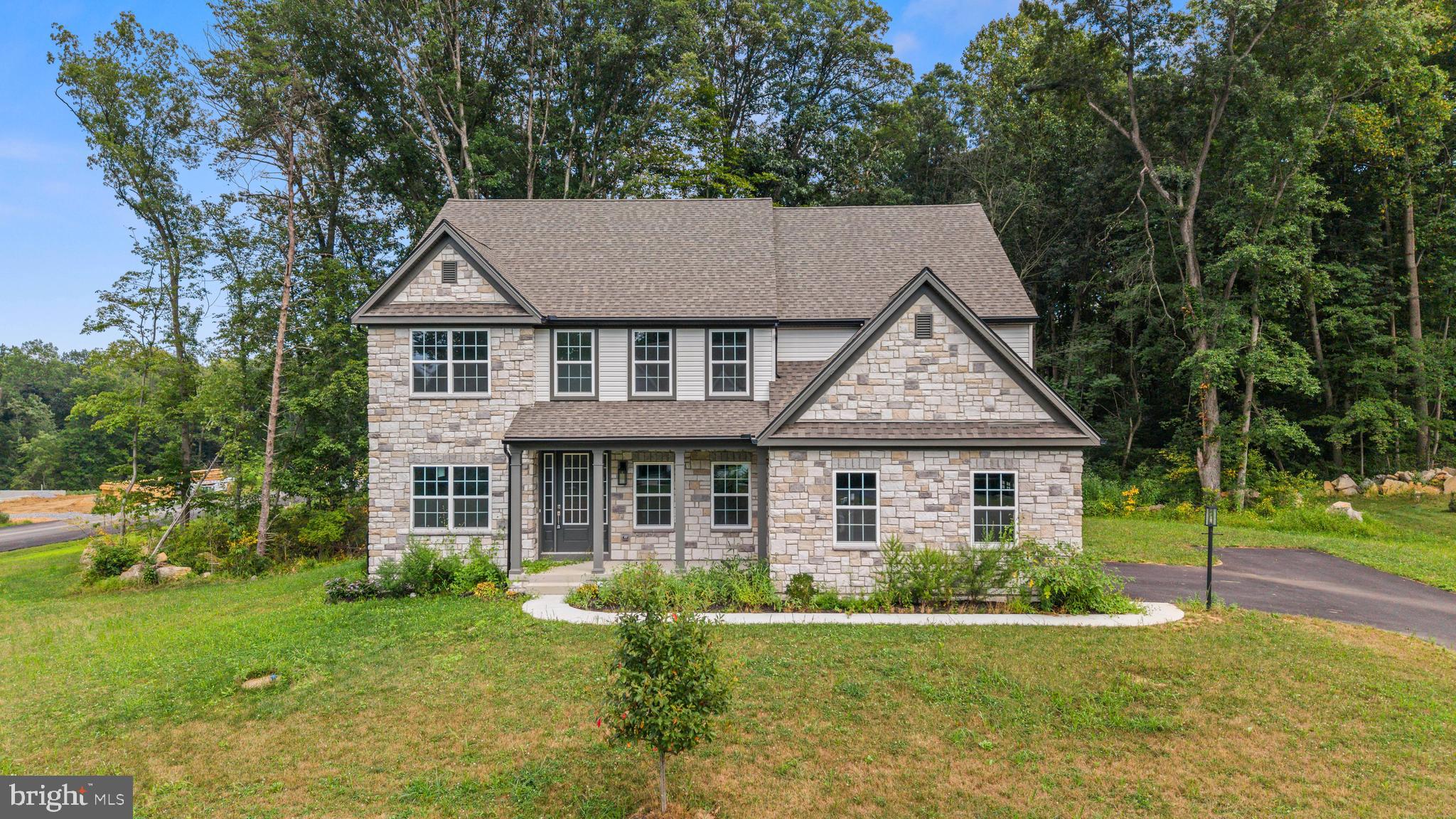 Welcome to this stunning new build offering over 3,700 square feet of finished living space. This 5-bedroom, 4.5-bathroom home features an open floor plan designed for both everyday living and entertaining. The gourmet kitchen is equipped with top-of-the-line appliances, upgraded cabinetry, and elegant finishes, opening to expansive living areas filled with natural light. The second level includes spacious bedrooms and well-appointed bathrooms, providing comfort and functionality throughout.
The property extends further back and to the left side when facing the home, providing additional space and privacy. With an acceptable offer, the sellers are open to selectively clearing trees to create even more usable yard area.
Enjoy the benefits of move-in readiness without the delays of new construction. The builder’s 20-year structural warranty conveys with the property. Schedule your showing today and experience all this home has to offer.
