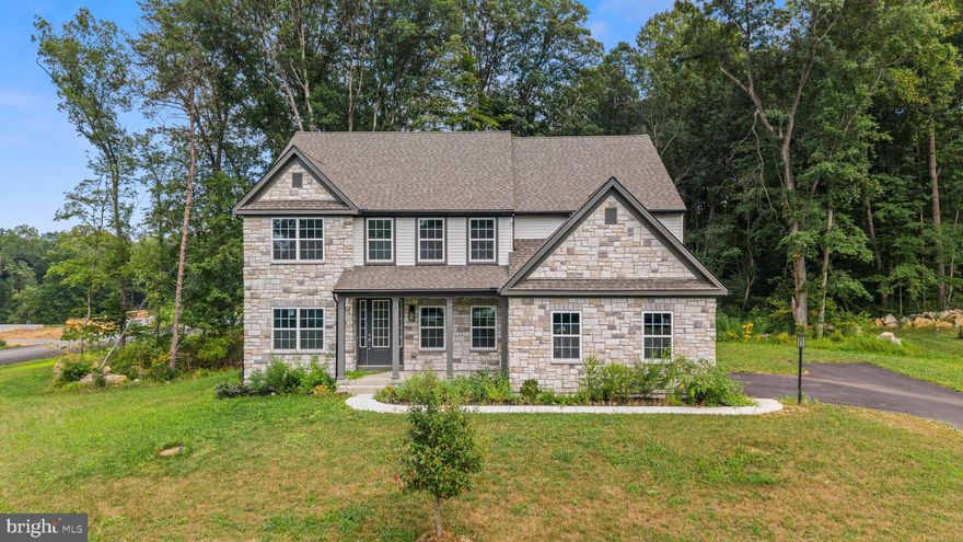 Welcome to this stunning new build offering over 3,700 square feet of finished living space. This 5-bedroom, 4.5-bathroom home features an open floor plan designed for both everyday living and entertaining. The gourmet kitchen is equipped with top-of-the-line appliances, upgraded cabinetry, and elegant finishes, opening to expansive living areas filled with natural light. The second level includes spacious bedrooms and well-appointed bathrooms, providing comfort and functionality throughout.

The property extends further back and to the left side when facing the home, providing additional space and privacy. With an acceptable offer, the sellers are open to selectively clearing trees to create even more usable yard area.

Enjoy the benefits of move-in readiness without the delays of new construction. The builder’s 20-year structural warranty conveys with the property. Schedule your showing today and experience all this home has to offer.