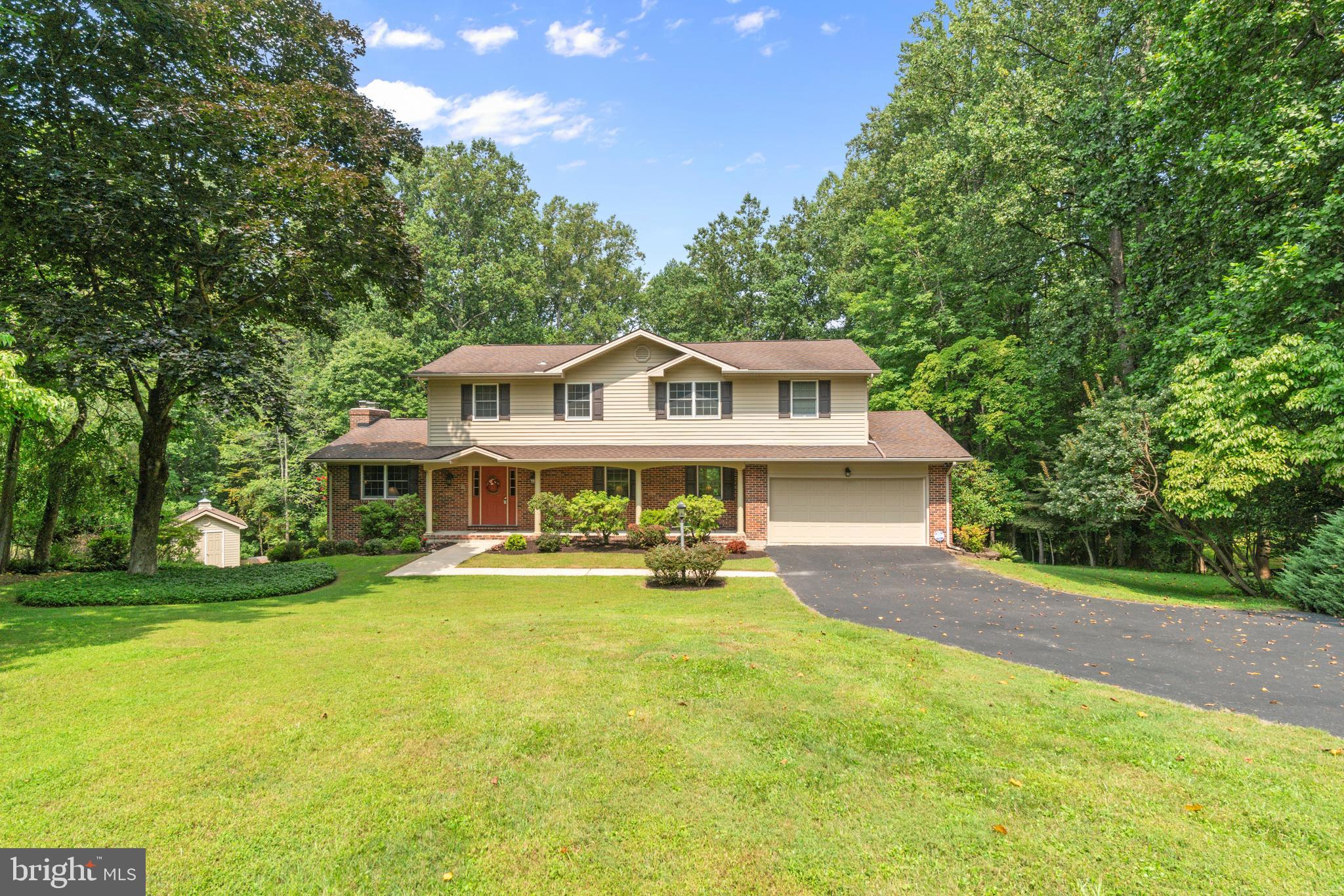 Gorgeous 4-Bedroom Colonial with 2 car attached garage on a Private Cul-de-Sac Backing to Trees
Nestled at the end of a quiet cul-de-sac in one of Glen Arm’s most sought-after communities, this stunning 4-bedroom, 4.5-bath colonial offers three beautifully finished levels totaling approximately 3,800 square feet and a private backyard oasis with a heated saltwater pool.
A covered front porch welcomes you into a spacious ceramic tile foyer with coat closet and updated powder room. To one side, an extended living room with dual access and a cozy center fireplace; to the other, a sun-filled family room leading to the updated gourmet eat-in kitchen—complete with granite countertops, white 42-inch cabinetry, stainless steel appliances, recessed lighting, under-cabinet lighting, marble backsplash, double-door pantry, and sliders to the upper rear deck. The main level also features hardwood flooring throughout, a formal dining room with crown and chair rail molding plus wainscoting, and an oversized first-floor laundry room.
Upstairs, the expansive primary suite addition showcases a luxurious en suite with dual vanities, jetted soaking tub, walk-in closet, and an oversized glass-enclosed shower with built-in bench and dual shower heads. A second bedroom also enjoys a private en suite, while two additional bedrooms share an updated hall bath with dual vanity and tiled shower surround.
The walk-out lower level offers incredible versatility with a bright rec room featuring luxury vinyl plank flooring, recessed lighting, and a granite-topped wet bar with glass-panel, backlit cabinetry; an office nook; an updated full bath; a sauna (as-is); a spacious utility/storage room with whole-house reverse osmosis system; and direct access to the covered lower deck.
Step outside to your own private retreat—two decks, a storage shed, expansive pool deck, and a heated, concrete saltwater pool framed by a stone retaining wall and serene wooded backdrop. All just moments from Loch Raven Reservoir, parks, and commuter routes.