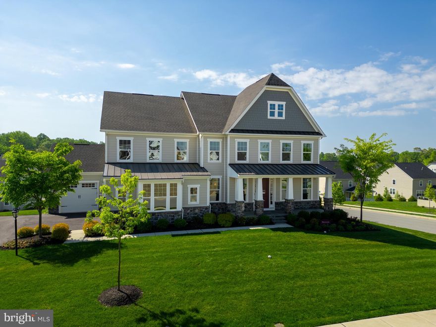 Are you looking for the luxury of a brand-new home in West Chester, but can’t find the land to build and/or don’t have the time to wait!? Your dream is about to become a reality with the offering of this never-lived-in model home in Greystone. 514 Seeger Ln was used as the builder’s decorated showcase model of the Marymount floorplan, and is fully upgraded throughout. Upon entering from your 3-car garage you are greeted by a large mudroom with custom cubbies and a generously appointed 1st floor bedroom with adjacent full bathroom. A designer kitchen will amaze not just for daily meals, but also at every special occasion that you will easily host, showcasing a 6-burner range, upgraded custom cabinetry and tile work, all highlighted by an oversized island with quartz countertops. This is open concept living where the kitchen and family room will undoubtedly be the heart of your home. The main living level also features a luxurious home office with custom built-in shelving and glass doors that overlook a formal dining room. The 2nd floor continues the theme of builder upgrades including an oversized owner’s bedroom with vaulted ceilings, custom moldings, and 2 walk-in closets larger than the average expectation. The owner’s suite features double doors that lead into an equally exquisite bathroom with a standalone soaking tub, upgraded dual showerhead, and custom tiled shower. There is also a neatly appointed laundry room, and 3 additional bedrooms on this floor. Two bedrooms share a Jack-and-Jill bathroom while the third has an en-suite full bathroom; all featuring quartz countertops and upgraded fixtures. If all this isn’t enough to exceed your expectations, the fully finished walkout basement features a 6th bedroom with a full bathroom and over 1,600 sq ft of additional living and entertainment space. There are double doors which lead to your private backyard patio, and you’ll also enjoy the custom deck off your kitchen area. Elegant living is equally matched by the community in which this home is set. There are 7 miles of walking trails within Greystone, and the location is just 3 minutes from West Chester Boro’s vibrant shopping/dining scene. The community also features its own elementary school which is in walking distance from your new home. Do not think twice about making an appointment to see this home today.