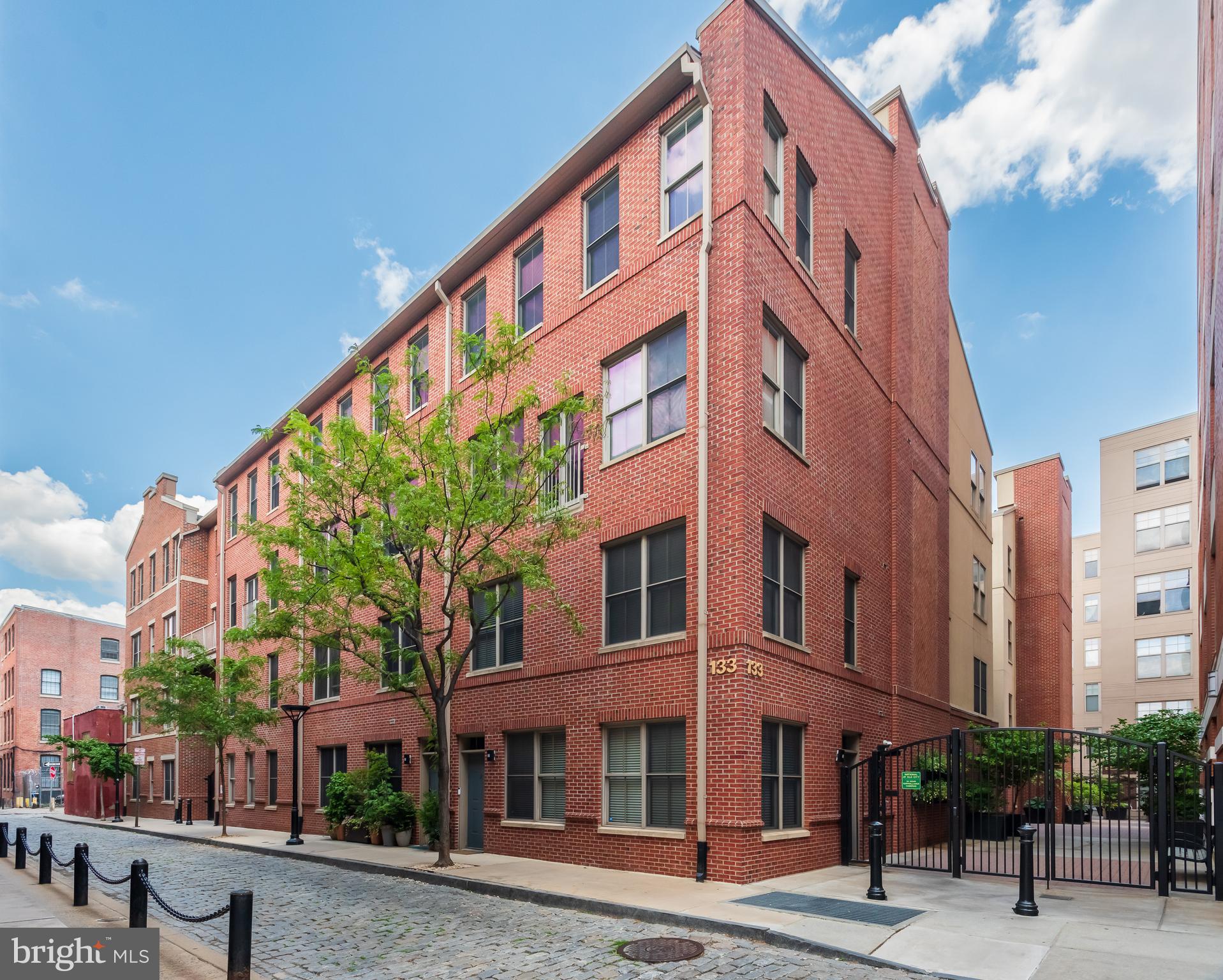 Welcome to 133 North Bread Street, Unit J3, a wonderful two story home in The National, one of historic Old City's most coveted addresses. A serene oasis set in the heart of one of Philadelphia’s most desirable neighborhoods. The best of city living plus a reserved, indoor parking space (spot # 125). The main level offers an open concept living and dining area. A gourmet kitchen features plenty of raised panel cabinet space, a granite backsplash, stainless steel appliances, granite countertops and a center island with pendant lighting. A perfectly situated powder room plus a laundry room/storage room/pantry complete the picture of this level of the home. The upper level is home to the owner's suite which features a nicely tiled en suite bathroom with double sink vanity and a huge walk-in closet with built -ins. A good sized second bedroom is serviced by a second full bathroom and also offers a large walk-in closet. Hardwood floors, great closet space, ceiling fans, a dedicated parking space and much more all come together to make this a very special place to call home. The National is a coveted gated community offering elevators, an inner courtyard, a tot lot and underground parking. Close to historic Elfreth’s Alley, Morgan’s Pier, the National Constitution Center & Liberty Bell and the fabulous shops and restaurants of Old City. This is a wonderful home in a prime location offering the absolute best in city living. A rare opportunity to live in a quiet home just steps to a vibrant neighborhood. This is the one. Welcome home.