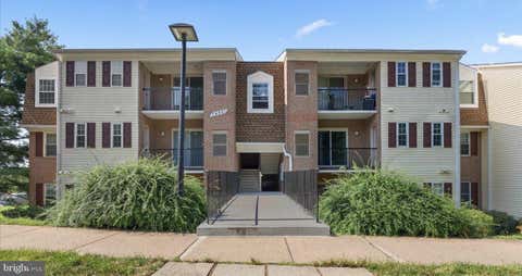 Photo of 14901 Rydell Road #101, CENTREVILLE, VA 20121 (MLS # VAFX2333586)