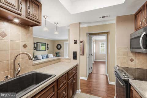 Photo of 14901 Rydell Road #101, CENTREVILLE, VA 20121 (MLS # VAFX2333586)