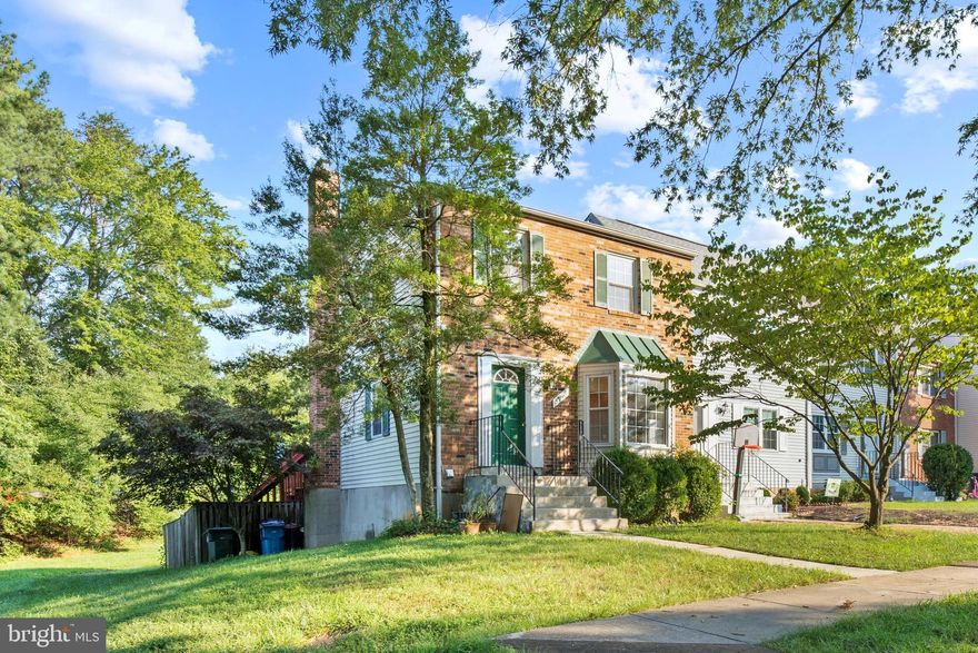 Situated on a large fenced corner lot on a cul de sac this 3-level END UNIT town home with WALKOUT basement will not last long. This large Brick front Lexington model offers an entertaining and easy living floor plan with several recent renovations. Fresh paint, new carpet, hardwood floor on main level and master bedroom. Updated master bathroom and 2nd bathroom. OFF STREET PARKING: 2 Assigned Spaces. Walk to the nearby VRE or take the bus which stops in front of the community. Several stores including grocery and restaurants are located minutes away.