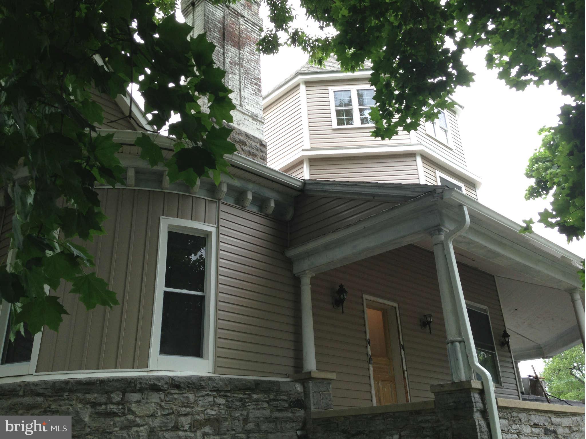 Lovely apartment with very large rooms. Water/Sewer/Trash and Lawn care is included in rent. Common laundry in building. Beautiful hardwood floors throughout in a great location! Available now.