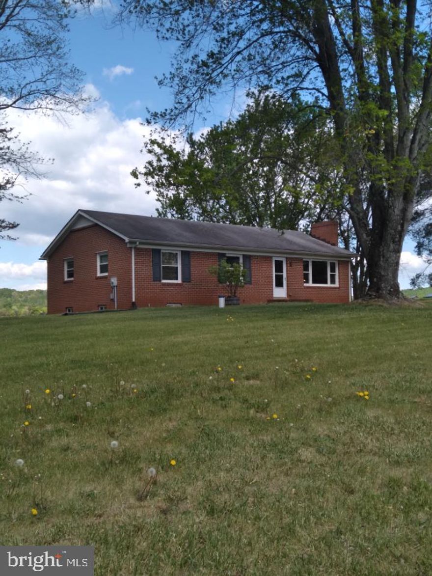 SHORT SALE. APPROVED SALES PRICE $235,000. SOLD AS-IS. Beautiful three bedroom brick/block home w/ full basement on 3.186 acres of land.  Bick Fireplace. New Well System. Washer/Dryer in basement.  Chicken coop partially built; materials on site for completion. Half bath in addition to the Full bath. Vinyl thermal pane windows.  Interior of home does need updating. Great catch for investor - or a building Contractor's dream! Short Sale. NO ONE WHO IS SICK/ SHOWING SYMTOMS SHOULD ENTER. PLEASE FOLLOW CDC GUIDELINES. THIS SHOULD BE QUICK CLOSE AS BANK HAS APPROVED THE SALES PRICE. Thank you.