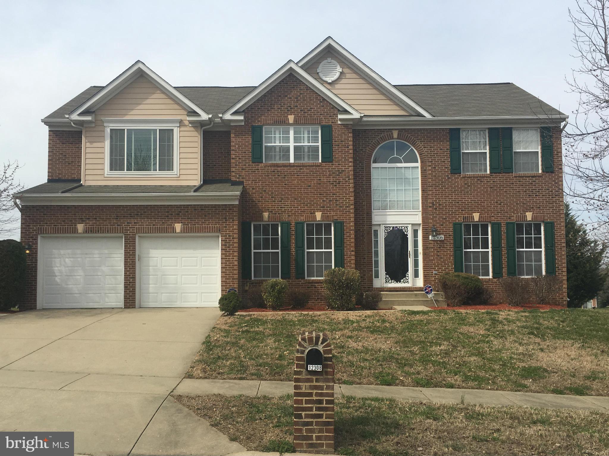 A rare gem! Beautiful, 4 sided, brick colonial located minutes from the newly developed Ritchie Station Marketplace. Featured amenities include, but are not limited to, large Master Bedroom with his & hers walk-in closets, Master Bath suite with soak tub, overlook into Family Room. Library has built in wall bookshelf and more!!