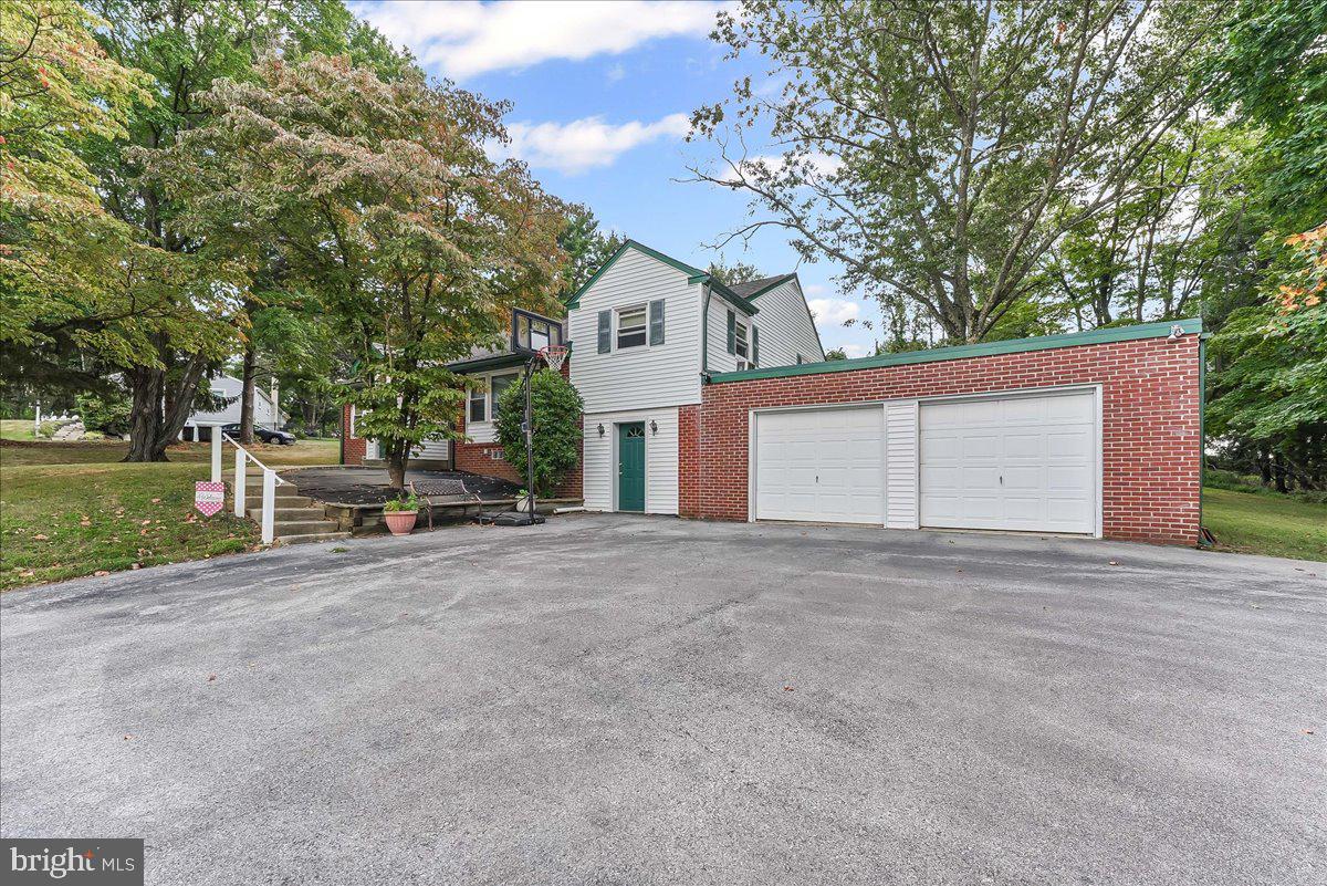Welcome to this charming 4-bedroom, 2.5-bath home located in the highly desirable and award-winning West Chester Area School District (Rustin feeder). Nestled on nearly an acre of land, this property offers a perfect mix of space, comfort, and convenience.
Inside, you’ll find hardwood flooring throughout, a bright eat-in kitchen, and a seasonal porch ideal for relaxing or entertaining. The finished lower level provides flexible living space with additional rooms perfect for a home office, gym, playroom, or more, plus a cedar closet for extra storage.
Updates include a newer sewer system (2 years old) and updated electrical throughout, offering peace of mind. Outside, enjoy the patio and fire pit, perfect for gatherings on cool evenings. A 2-car garage and plenty of driveway space complete the package.
A separate entrance offers the potential to create an in-law suite or private living space. Outside, enjoy the tranquility of the property while still being within walking distance to Stetson Middle School and just minutes to downtown West Chester, shopping, dining, and major commuter routes including 202, 926, and 100.
This home truly has it all—location, land, updates, and potential. Don’t miss your chance to make it yours—this gem won’t last!