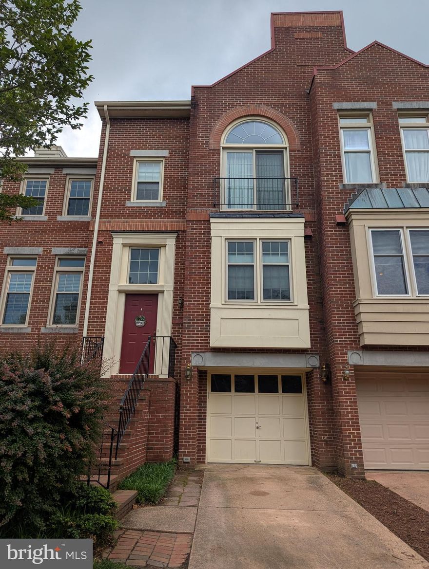 Experience the exceptional blend of space, comfort, and convenience in this impressive four-level townhome within Lenox Place at Sunnyside. The expansive main level welcomes you with soaring ceilings, an open living and dining area featuring floor-to-ceiling windows, a cozy fireplace, and living room home theater system. The updated kitchen showcases rich wood floors, sleek appliances, stylish granite countertops, a charming breakfast nook, and a convenient pass-through to the dining room. Ascend to the upper levels where three comfortable bedrooms and two well-appointed bathrooms await, including a primary suite boasting vaulted ceilings, its own A/C mini split, and a generous walk-in closet. The laundry is also located on the upper level for your convenience. The lower level provides an expansive family room with sliding glass doors leading to a spacious patio deck, along with a convenient half bath, abundant storage, and direct access to the attached single-car garage. Situated in a sought-after location, this home offers easy access to parks, trails, diverse shopping, delightful dining, and vibrant entertainment options, and is just moments from Del Ray, Old Town, Shirlington, Reagan National Airport, the Pentagon, and main routes into Washington, D.C. Plus, right in at the neighborhood entrance on W Glebe Rd there are bus stops with direct routes to the Pentagon and the Mark Center.