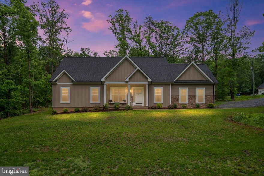Welcome to 12600 Wilderness Park Drive, a single-story ranch home built in 2022, located in the Lake Wilderness community of Spotsylvania, Virginia. This 4-bedroom, 2-bathroom home offers a functional and open layout with a well-designed kitchen, a separate laundry room, and a two-car side-load garage. The heart of the home is the stunning kitchen, equipped with modern appliances and finishes. Adjacent to the kitchen, the open-concept living and dining areas create an inviting space for family gatherings and entertaining guests.

The home sits on a large lot with a  landscaped front yard, a low-maintenance Trex deck in the back and a front porch. The property is move-in ready and designed for practical, everyday living. The craftsman farmhouse exterior will catch your eye the moment you drive up!

Lake Wilderness offers a range of community amenities including lakes, a community pool, clubhouse, tennis and basketball courts, a beach with a volleyball area, picnic spots, playgrounds, and walking trails. 

This home provides a solid combination of newer construction, usable outdoor space, and access to neighborhood amenitities!  Schedule your tour today.