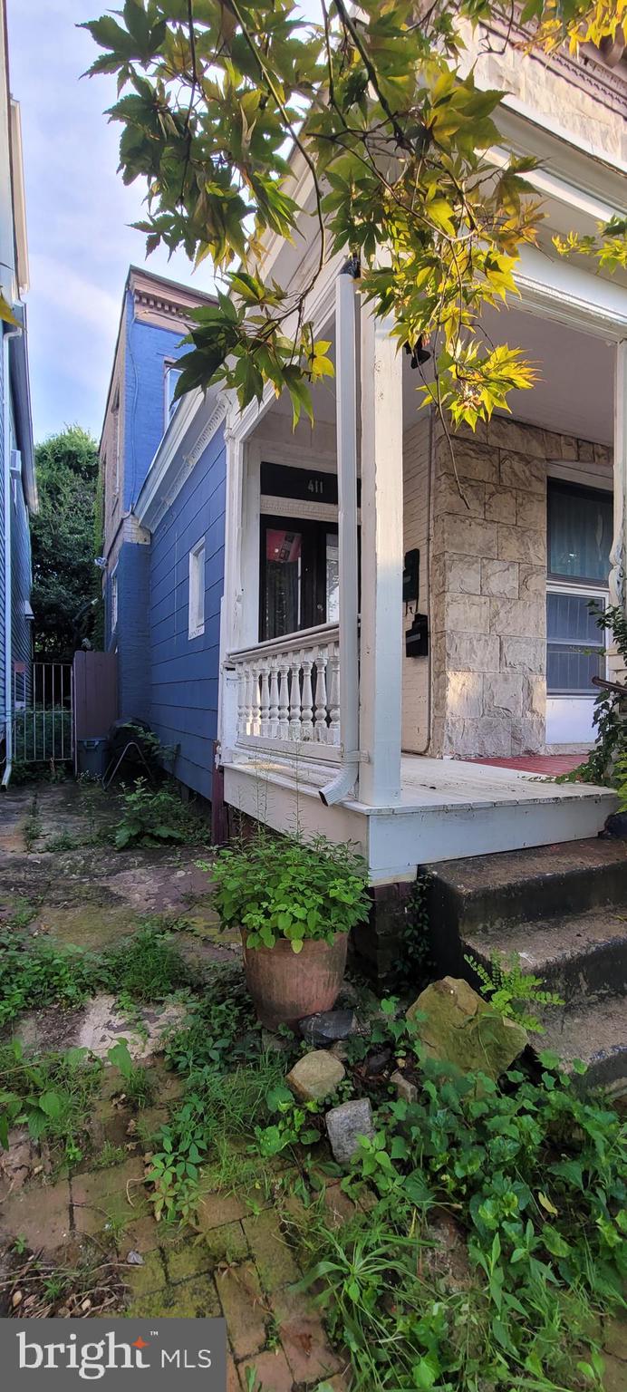Price improvement!! Bring your vision for your dream home and your contractor, and make this historic 1875 home your own!! This home is located in Charles Village, close to Union Memorial and Johns Hopkins University. The main floor unit has 2 bedrooms, hardwood floors, and a non-functioning fireplace. The second floor has a 1-bedroom unit. The property is priced with repairs in mind. You could live in one unit and let the other pay most of your mortgage. This is a great way for you to build wealth and equity in your new home. Whether you keep it as an income-producing 2-unit property to help pay your mortgage or return it to its original single-family self, this great home has so many great features.