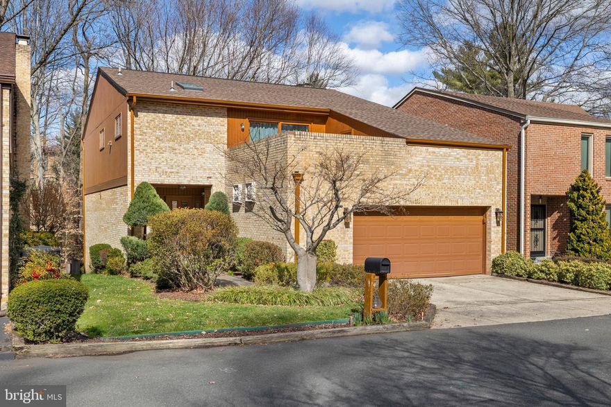 Welcome to your dream home nestled in the highly sought-after neighborhood of Great Oaks in Fairfax! This rare gem offers a perfect blend of modern luxury and timeless charm, creating a residence that truly stands out! As you enter through the front door you’ll be greeted by an inviting, open, and sunlit space that welcomes you home. The main level boasts an open and meticulously renovated kitchen, seamlessly connecting to both a spacious dining room and two expansive living areas. Picture yourself entertaining your guests in the warmth of the fireplace or on the outdoor Trex deck, where breathtaking views of nature await. Also included on the main level is an updated half-bath. 

The top floor includes three bedrooms, two full baths, a convenient washer/dryer room, and a second living area perfect for a library or office, which leads to a second outdoor space providing a tranquil retreat for your enjoyment. The luxurious owner's suite features a large walk-in closet, a cozy fireplace, a spa-like bathroom, and incredible scenic views. Discover versatility in the second bedroom which includes a bonus room ideal for a play area, library, or additional storage. The surprises continue in the large finished basement where a wood-burning stove, a well-appointed bar, a full bathroom, and double sliding doors open to a covered rear patio with beautiful nature views and a pond.

This home is not just a residence; it's an experience. Enjoy three distinct outdoor spaces, including a private Trex deck and covered rear patio. The convenience of a two-car garage with professionally epoxied floors, an EV adapter, and extra storage adds to the allure.

Recent upgrades include a new HVAC system, water heater, gutters and guards, Pella sliding doors, Vivint security system, and an electrical sub-panel. Adjustable timers on all outdoor lights and a new LG washer and dryer further enhance the modern living experience.

Embrace the opportunity to make this truly special home yours, where every detail has been thoughtfully curated for a lifestyle of comfort, style, and sophistication. Your home in Great Oaks awaits!