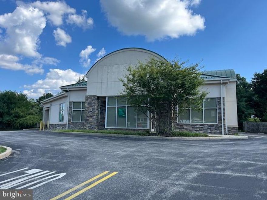 Excellent opportunity to purchase a beautiful commercial property , located on the corner of West Chester Pike and Providence Road, with outstanding drive-by and high visibility.  Situation on nearly an acre  with ample parking minutes to SAP America, the new Town Center at Ellis Preserve.   The building is currently set up as a bank with drive up windows, conference rooms (4+), large lobby,  and restrooms.  Could be converted to accommodate many different uses.