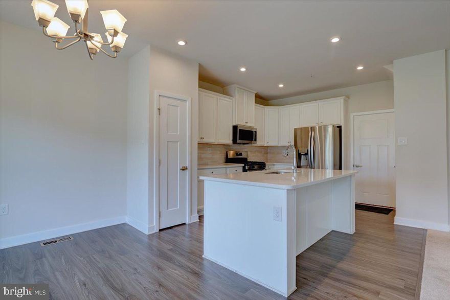 Welcome to 1050 Moscariello Lane — a stunning, North-East facing end-unit townhome in the highly sought-after Spring-Ford Area School District.
Built in 2021, this modern, move-in-ready home offers 3 bedrooms, 3.5 baths, and nearly 2,839 sq ft of beautifully finished living space. The bright open-concept main level features 9-ft ceilings, a chef’s kitchen with upgraded stainless-steel appliances, quartz countertops, and a large island ideal for entertaining.

Upstairs, a spacious owner’s suite boasts a walk-in closet and private bath with double vanity and extended shower. Two additional bedrooms, a full bath, and convenient laundry complete the upper level.

The finished basement with dedicated home office adds flexible space for work, fitness, or recreation, while a two-car garage and built-in security system deliver comfort and peace of mind.

Enjoy outdoor living on the deck overlooking open community space — all within minutes of 422, Providence Town Center, shopping, and dining.

Why wait for new construction? This 2021 end-unit offers premium upgrades, energy efficiency, and low-maintenance living — all in one of Montgomery County’s most desirable communities.