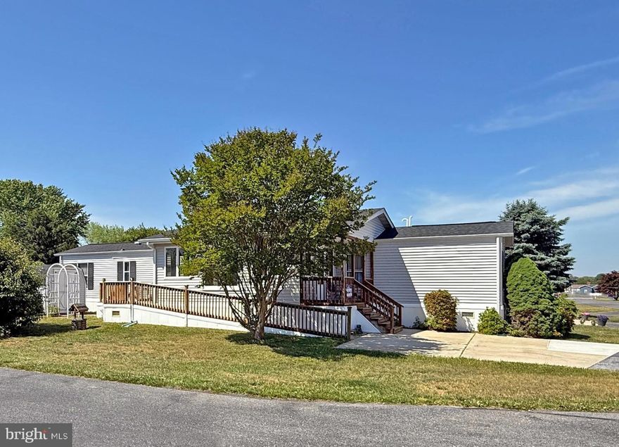 Seller says, "Bring an Offer!"  Sussex East/West is a leased-land, 55-plus* community (*up to 20% of owners may be younger than 55-years-old).  Sussex East is located approximately 5.5 miles from the Lewes public beach, with the Cape Henlopen State Park beaches...and the famous Rehoboth Beach boardwalk not much farther away.  This community has a unique location with direct access to the State Park’s hiking/biking trail through common grounds!  This spacious 14’x70’ singlewide features a 11’x20’ enclosed porch with vaulted ceilings. There’s a covered front porch, and there is an 11’x10’ open, rear deck that leads down to the patio and storage shed. The home’s living room, which has a coat closet, opens to the eat-in kitchen. Appliances include a fridge, dishwasher, gas range, and a built-in microwave. The hall laundry has a full-size, side-by-side washer & dryer set. Popular split bedroom plan. The main bedroom is at the rear of the house, and it has a double closet. The first full bath is just outside of the main bedroom, and it features a step-in shower. The other two bedrooms are near the second full bath, which also has a step-in shower. Natural gas. Gas force air heat, central AC & a portable AC unit for the sunroom. Storage shed. Being offered AS IS - needs a bit of TLC. Two pets are allowed in Sussex East, and they have a fenced dog park near the community’s indoor salt-water pool. (Note: Family & friends may always visit, but rentals and subletting are NOT permitted in this community). Leasehold interest: Current Lot Rent of $1,003/mt. (Lease will renew again on June 1, 2026 with any increase capped as per 25 Del. C. Sec. 7050-7054). Homeowner pays electric, water, sewer, fuel (metered natural gas), recycling & lawn maintenance. RHP, the community owner, requires an Application from the Buyer, with acceptance based on the following criteria: 1.)income verification, 2.)favorable credit bureau score, including evaluation of debt-to-income ratio, and 3.)clean criminal background check. Financing may be available to qualified borrowers from only a few Lenders that specialize in installment/chattel loans for manufactured homes on leased land. Closing costs will include a 3.75% transfer tax (DMV Doc Fee) & a Settlement Agent fee.