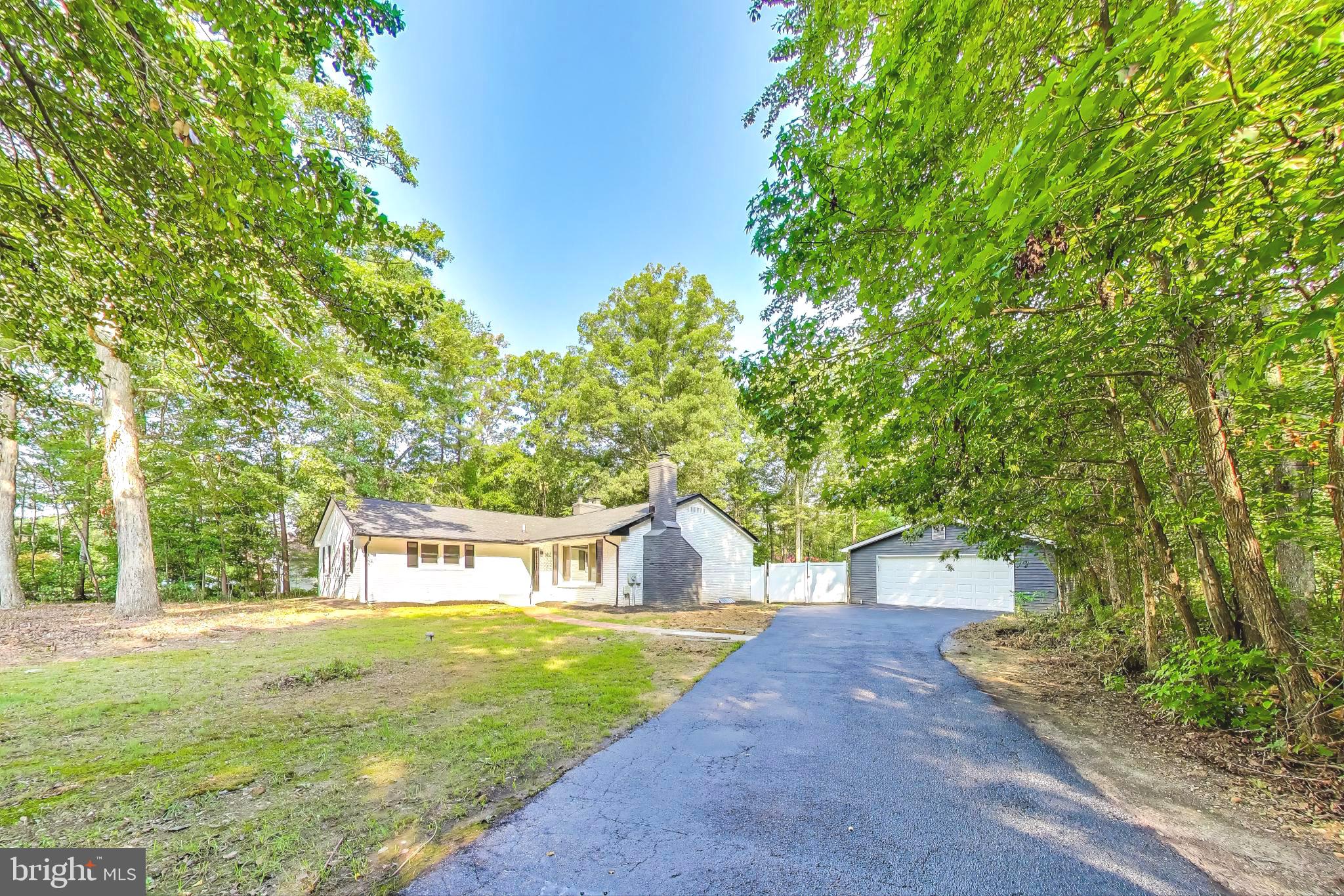 Fully Renovated Modern Rambler on 1.34 Acres in the Heart of Waldorf with NEW ROOF — No HOA, North Point High School & Fully Fenced Backyard
Welcome to luxury living redefined—a rare opportunity to own a completely remodeled 4-bedroom, 2-bathroom home on 1.34 acres of private land in the highly sought-after Waldorf area. With no HOA restrictions, top-rated North Point High School zoning, and upscale designer finishes throughout, this property combines comfort, convenience, and elevated style like no other.
Step into this modern masterpiece and experience true turnkey living. The open-concept main level boasts a sun-filled living room, designer lighting, and premium LVP flooring. The show-stopping gourmet kitchen features quartz countertops, a large island, custom cabinetry, and state-of-the-art stainless steel appliances—perfect for hosting or preparing your favorite meals in style.
Both full bathrooms have been fully reimagined with spa-like finishes, including rain showers, elegant tile work, and modern vanities that create a serene, luxurious atmosphere.
The fully finished basement expands your living space dramatically—ideal for a media room, home office, guest suite, or recreational area. It’s the perfect blend of functionality and sophistication.
Outside, the property continues to impress. The fully fenced backyard offers privacy, safety, and a secure space for pets, kids, or outdoor entertaining. With 1.34 acres of level, usable land, you’ll have plenty of room for a garden, play area, or even a future pool. The oversized detached two-car garage adds even more versatility—ideal for a workshop, gym, or extra storage.
Key Features:
Fully remodeled from top to bottom
4 spacious bedrooms, 2 full designer bathrooms
Gourmet kitchen with quartz countertops and high-end appliances
Spa-style bathrooms with premium finishes
Fully finished basement for added living space
1.34 private, fully fenced acres — rare lot size in central Waldorf
Oversized 2-car detached garage
No HOA
Zoned for North Point High School
Homes with this level of renovation, privacy, and land rarely come to market in such a prime location. Don’t miss your chance to own this exceptional home that truly has it all.
Schedule your private showing today and experience the best of Waldorf living.