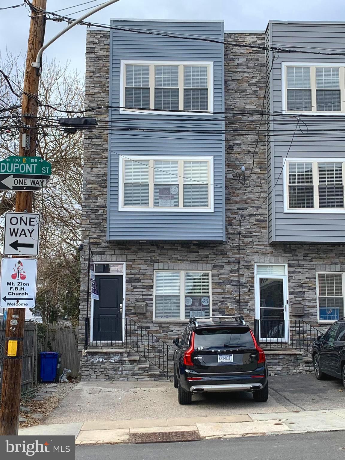 Welcome to State of the Art living in the heart of Downtown Manayunk!  Aside from the Perfect Location, this Amazing and Immaculate Townhome offers 5 Spacious Bedrooms, 3 Full Bathrooms, 2 Car Off Street Parking, and Incredible Views!  As you first walk in, you will notice the incredible attention to detail with all of today's high-end amenities.  The first floor creates a fully Open floor plan, sun filled from the large windows and sliders, with upgraded flooring, high ceilings, recessed lighting and a Gourmet Kitchen.  This open Kitchen/Dining area is perfect for entertaining or the aspiring chef, with a 5-Burner Gas stove, Oversized Island, sparkling white Quartz Countertops, Stainless Steel appliances, and rich wood cabinetry.  The kitchen leads into an incredible Backyard Oasis, tree lined and private, updated with low-maintenance grass, plantings and a patio.  The Second Floor includes 2 large bedrooms, both with large windows and closets and a hall bath with tub/shower combo, custom tilework, and contemporary feel.  Laundry is also on the second floor. The Masterpiece is the Primary Bed/Bath Suite located on the 3rd floor.  A Huge Primary Bedroom with a wall of windows, high ceilings, and a fully outfitted walk-in closet system. The King-sized Primary Bath has an extra-large, updated spa-like glass shower, and double vanity.  The Suite also boasts a private Rooftop Balcony with views of the back trees, and the hills of Manayunk. The fully finished basement offers 2 additional bedrooms, which could also be used as a home office or workout room, and another full hall bathroom, again boasting that contemporary feel.  Combine this Amazing Home together with Location, steps away from  the many restaurants, shopping and events on Main street, the Schuylkill valley trail, and quick access to Septa and i76 and the city, and you have found the Perfect Home!