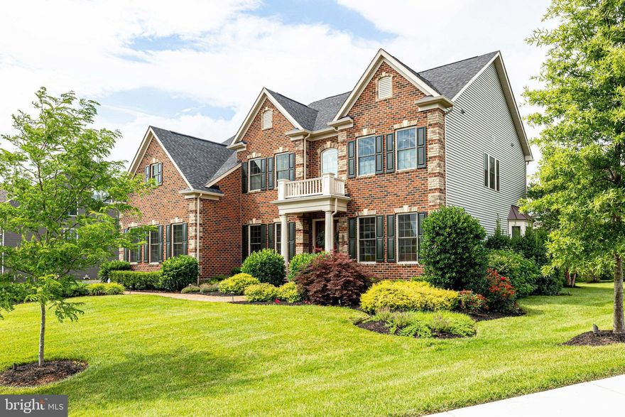 Situated on a sweeping corner lot, this 3-level, 5BD/4.5BA Craftsman features state-of-the-art technology for frictionless living. Built in 2017, with 7000 square feet of living space, this home features an indoor AND outdoor kitchen,ÃÂ  $250K sunroom addition, $20K light fixture upgrades, gorgeous hardwood floors, and impeccable enhancements. A must-see former model home professionally decorated and designedÃÂ by an award-winning interior design firm - Interior Concepts, INC!ÃÂ 

Double front doors generously welcome you into the bright foyer with airy, 9 ft ceilings. A sumptuous formal dining room and customized living room highlight the front of the residence. Walking into the heart of the home, natural light pours into the two-story family room, brightening the adjacent gourmet kitchen and breakfast room. A large island anchors the kitchen which features luxury branded stainless steel appliances (Thermador, Bosch, Electrolux) including double convection ovens, gas cooktop, wine fridge, and miles of countertop space. The bar addition includes two Fisher & Paykel drawer dishwashers (excellent for glassware!) and an undercounter ice maker. Access the incredible sunroom via double french doors by the breakfast room. The sunroom adds  700 sq feet of unique indoor/outdoor living with a professional outdoor kitchen, double-sided fireplace, and flat-screen tv. Highlights of the outdoor kitchen include a Blaze grill, power burner, infrared burner, warming drawer, and undercounter refrigerator. Smart skylights automated to open and close based on time of day, temperature, rain, and CO2 levels. A sun-lit private office with custom built-ins and a convenient powder room complete the main level. Two staircases on either side of the home provide access to the upper level, while the staircase by the kitchen also provides access to the lower level.

Upstairs, retreat to the luxurious primary bedroom, a sanctuary with its own sitting area and covered deck. Dual walk-ins provide plenty of closet space. Relax in the spa-like ensuite bathroom which features a deep soaking tub and two soothing, rainfall showerheads in a separate shower stall. Dual vanities and a private toilet room complete the primary bathroom. Another spacious bedroom with an ensuite bathroom serves as a second primary bedroom! Two additional, large bedrooms are connected by a shared bathroom. Laundry room with front-loading GE W/D conveniently located upstairs. 

Downstairs, an extensive, fully-finished walk-out basement has it all! The lower level features a deluxe wet bar with wine fridge and GE dishwasher, a temperature-controlled wine room, rec room, media room, home gym, and full bathroom. From the home gym, walk-up to the beautifully landscaped backyard. Extensive landscaping throughout the property includes a wifi-enabled irrigation system. A large stone patio and outdoor fireplace add another layer of outdoor living. Attached 3-car garage provides possibilities for a home workshop and additional storage. Additional smart home features include wifi-controlled window shades, wifi-enabled Control4 System speakers in most rooms, timed low-voltage LED lighting throughout, and a comprehensive alarm system.

Ideally located to experience the best of DC and Northern Virginia! Enjoy proximity to Dulles (IAD), Loudoun County wine country, and several golf courses. Outdoor opportunities abound with several local parks within walking/driving distance. Variety of shopping, dining, entertainment within a 10-20 min drive (Reston Town Center, Dulles Town Center, and TysonÃ¢ÂÂs Corner). Zoned for Fairfax County Public School. 12 min to Wiehle-Reston Metro (Silver Line). Easy commuter access to Leesburg Pike (RT7), Fairfax County Parkway (RT286). 40 min drive to DCA and downtown DC. DonÃ¢ÂÂt miss this exceptional opportunity to own in Summerhouse Landing!