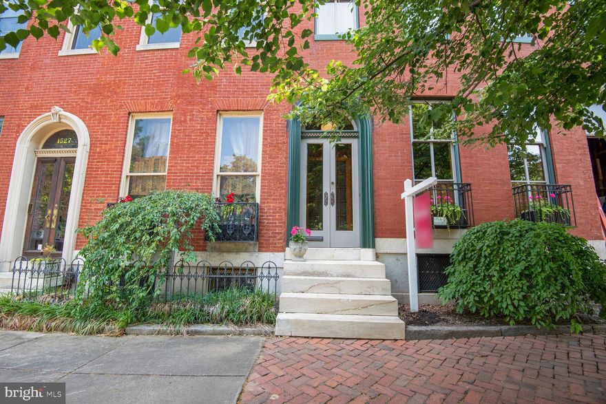 Unexpected opportunity to buy this stunning 19th century upscale Baltimore rowhome in Union Square is conveniently located near downtown, Camden Yards and I-95. A large portion of the residence was exquisitely restored by a master craftsman including all custom insulated glass windows, walnut pocket shutters and kitchen cabinetry and more. This property also offers many tax incentives, credits and grants. The Italianate facade features a 40ft high cornice, solid brick walls, white marble steps, double entry doors with beveled glass and elegant arched door surround. The grand entrance way leads to a lovely front hallway with a ceiling light that once hung in Baltimore City Hall. The interior includes high ceilings, french doors, plaster moldings and ceiling medallions, brass lighting fixtures, hardwood floors and a graceful staircase that gently winds to the 3rd floor partially unfinished level. The main level is beautifully appointed. The living room has a marbleized slate fireplace with gilt mirror and floor-to-ceiling windows that overlook the historic Square and fountain. Formal dining room has another lovely fireplace with mirror. Sunny eat-in kitchen provides access to an absolutely gorgeous serene backyard with brick terrace and mature garden. The 2nd level has a full bath with claw foot tub and is currently used as a family room, office and bedrooms. Third level has a separate utility meter and can be completed as a private suite or as an income producing property, if desired. Unfinished lower level has lots of room for storage and access to backyard. Must see this magnificent rowhome the likes of which are rarely up for sale. ***BUYER'S FINANCING FELL THROUGH***