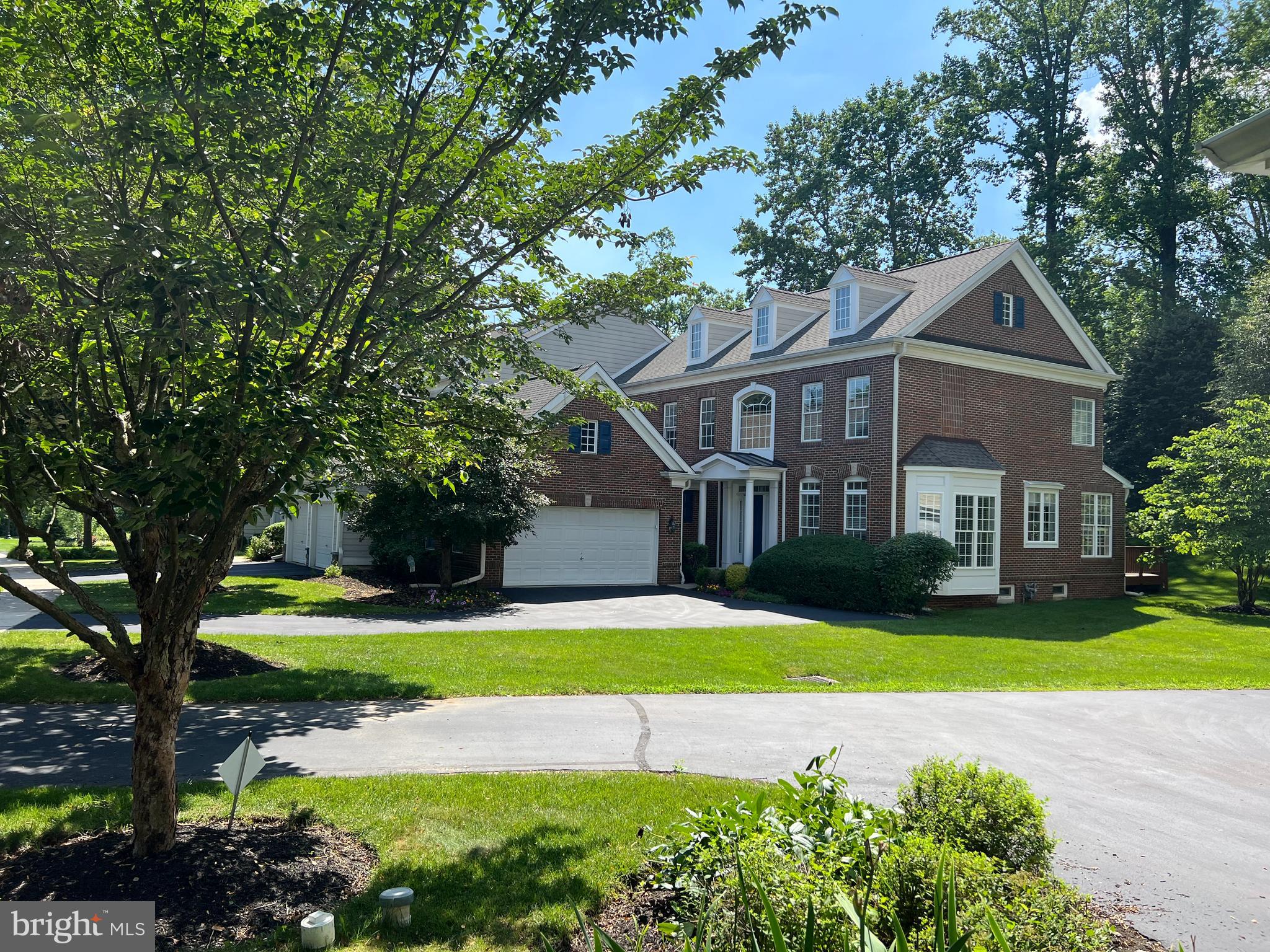 Nestled in the serene community of Springton Pointe Woods, this exquisite home offers the comfort of single-family living amidst mature woodlands and expansive green spaces. Every window presents picturesque views, enhancing the home's open-concept design. The grand two-story Entrance Hall leads to a spacious Great Room with a gas fireplace, a formal Dining Room, and a gourmet island Kitchen equipped with stainless steel appliances, granite countertops and pantry closet. Adjacent is a sunlit Breakfast Area that opens to a large enclosed deck, perfect for al fresco dining or relaxation. The FIRST FLOOR PRIMARY SUITE boasts 2 generous walk-in closets and a luxurious Bath with a soaking tub, frameless shower, and private commode. Conveniently located nearby are a Powder Room and Laundry room. Upstairs, a second Primary Suite offers a spacious retreat with a walk-in closet and well-appointed Bath. Two additional Bedrooms share a full Hall Bath, and a versatile Loft space provides options for an office, exercise room, or creative space. The finished Lower Level features a flexible area suitable for a home theater, playroom, or gym, along with a substantial unfinished storage area for future expansion. An oversized two-car garage with an electric opener provides ample parking, complemented by additional driveway space for guests. All this and the condo association provides exterior building maintenance, snow removal, lawn care, trash removal and more. Minutes to all that Newtown Square has to offer where you will find no end to great restaurants and shopping as well as an easy commute to the airport and center city Philadelphia. With a versatile and spacious floor plan that includes Primary Suites on the first AND second floor, this could be your Forever Home.