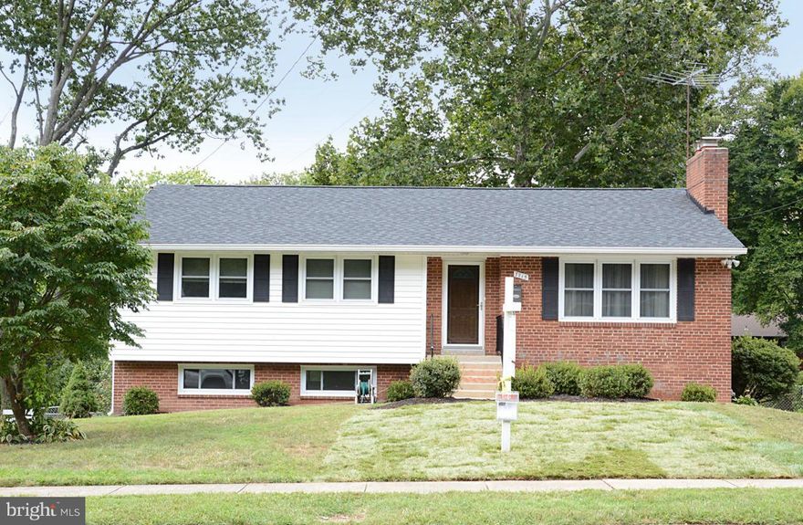 Charming home offering location & quality - inside the beltway! 5 BR and 2 Full Baths, updated kitchen with granite countertops. Gas Fireplace and delightful sunroom addition. Finished walk out Basement. Fleshly painted and new carpet.  Not-to-be missed!
