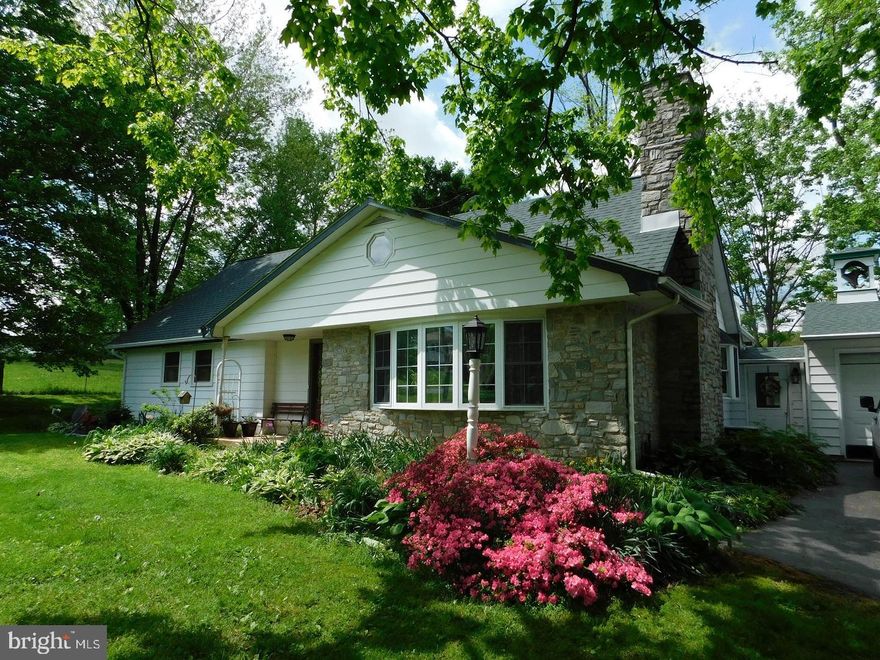 Beautiful 10.5 acre agricultural property with cape cod home, pole barn and warehouse. Perfect for your lifetime farmette.