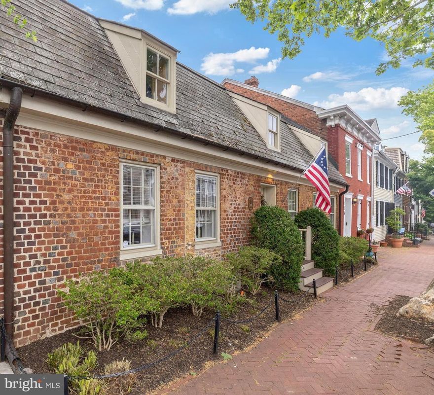 Rare opportunity to own a remarkable piece of Annapolis history! The Patrick Creagh House c. 1740 (also known as 160 Prince George Street) is an architecturally significant residence that has been thoughtfully adapted for modern living while preserving its timeless character and craftsmanship. Ideally located in the heart of Annapolis just one block from the US Naval Academy Gate 1, City Dock, Main Street and the Maryland State House, this exceptional home offers the best of historic charm and downtown convenience. A welcoming center hall introduces spacious living and dining rooms designed for both elegant entertaining and comfortable everyday living. The private patio and garden create a serene outdoor extension of the home’s living spaces. Upstairs, the home features a primary suite with full bath, two additional bedrooms, a second full bath, and convenient laundry. The lower level provides ideal space for a wine cellar, storage, or additional utility needs. This distinguished 18th-century property has been extensively researched and documented and is listed on the National Register of Historic Places for its architectural importance and contribution to local history.