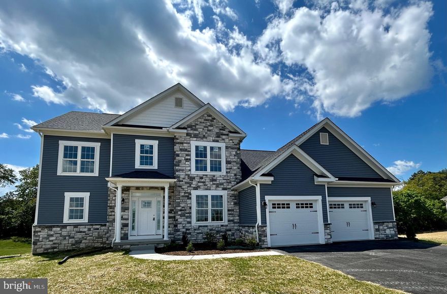 Wonderful to be built starting in spring and completion by late summer early fall.  This 4 bedroom home with first floor owners suite and onsuite  awaits you.  The open concept home boasts granite and or quartz counters large island fireplace and oversized kitchen and dining.  This home backs to the woods for privacy and  has a large yard.   The second floor boasts 3 large bedrooms and 2 full baths.