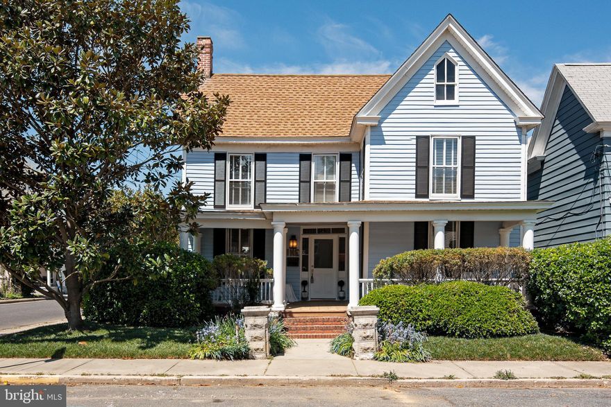 9 West  End Avenue - a perfect blend of sophistication and tranquility.  #9 is proudly sited on the corner of West End Avenue and Hambrooks Blvd...just 5 houses from the banks of the mighty Choptank River!  Now  is the perfect time to host an upstairs porch party with views of the beautiful river. 

 # 9 has been quietly owned by a professional couple from DC for almost 20 years.  You can see the subtle city influence in various details of every room, but, more importantly,  you can glimpse the wife's artistic attention to minute details throughout this charming haven.

Charles Goebel, a highly-respected Easton architect designed the renovations and additions.  The work was flawlessly executed by esteemed  Cambridge builder Thom Huntington.  The renovations included a new Living Room, a glamorous first-floor bathroom, and generously-sized porches on the first floor, covered by a gull-winged roof. The outstanding spacious kitchen features a multitude of light sources, a top-of-the-line propane range with hood, a built-in microwave drawer, and beautiful Carrara marble countertops and backsplash.  A pass-through bar area to the dining room provides a great casual seating arrangement in addition to the formal dining room.   

The upstairs second floor offers 3 bedrooms and a full bath but the most captivating aspect of the 2nd floor is the beautiful balcony off the central hall.  The balcony has views of the river and the beautifully landscaped garden. In total, there are 4 outdoor porches and balconies. The back garden is an amazing oasis of specimen plantings and magnificent trees.  The well-placed potting shed makes gardening a delight. The front porch's trompe l'oeil floor and sky ceiling were designed and painted by Mike Rosato,  a locally acclaimed artist whose work can be found throughout the city and in numerous museums throughout the country. 
#9 West End's location is ideal for strolling to the Farmers Market or the  Cambridge Yacht Club and is just a short walk to all of the downtown restaurants, galleries, and shops.   The renaissance in Cambridge is alive and flourishing.  Please call Mary for additional details and a tour today!