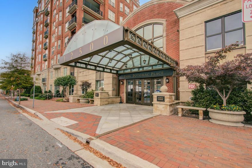 More Photos Posted on Friday! Experience Luxury Living at Its Finest in this sun-drenched North Tower residence, offering serene pool and courtyard views! This 2 bedroom, 2 bath unit has a fantastic layout, including a covered balcony.  This unit features two bedrooms positioned on opposite ends for privacy, two full baths and a half bath powder room in the front entryway. The gourmet kitchen showcases Viking wall ovens and microwave, a Sub-Zero refrigerator and a Bosch dishwasher.  This unit includes two premium parking spaces and a private enclosed storage room, conveniently located near the elevator. Park Potomac Place offers 24-hour concierge service, on-site management, a building engineer, porter service, beautifully landscaped grounds, elegant clubroom with catering kitchen, private courtyards with grills, outdoor pool, state-of-the-art fitness center, guest suites, ample visitor parking, and shared EV charging stations. Enjoy the convenient Park Potomac lifestyle—featuring an array of dining options, cafés, retail, and more.  With direct access to I-270 and quick routes to Bethesda, downtown DC, Virginia, and three international airports, this location offers the best of Potomac.