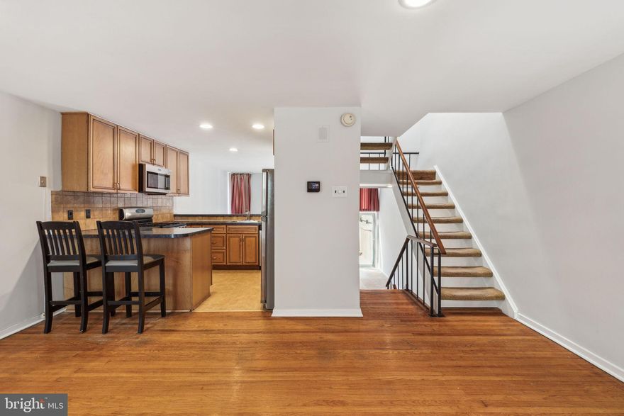 Discover 18 University Mews, a unique community nestled in the heart of University City, Philadelphia. This warm and inviting 3-bedroom, 1.5-bath residence comes with the added bonus of a one-car garage and an additional parking spot in the driveway! As you walk in, there is a coat closet and access to your garage. Heading to the next level you’ll find a large, sun-drenched living room with access to a private patio. Going up a few steps, you’ll find another brightly-lit space for the dining room and kitchen. On the next level are three bedrooms with ample closet space, as well as the full bathroom. This home has oak hardwood in the majority of the living spaces on the upper levels. From the entry, if you head down a level, there is a finished space waiting for the new owner to put their personal touches on it, along with a half bath. 
University Mews is a charming community consisting of 47 modern homes surrounding a serene, private courtyard—creating a peaceful retreat from the city's hustle and bustle. The shared courtyard offers a wonderful space to unwind or connect with neighbors, providing the best of both private and community living.  Located near the center of the community, this home is just moments from the beautiful courtyard and within walking distance to both the University of Pennsylvania and Drexel University. Perfect for those who want to be close to campus life, it’s also within the highly acclaimed Penn Alexander School district, known for its outstanding K-8 education.
Homes in this community don’t come on the market often—don’t miss your chance to make this stunning property your own! Schedule a tour today.