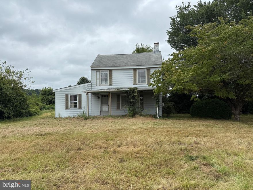 Approximately 2 acres zoned Village Center. Currently improved by older 2 story dilapidated house in need of tear down.  Do not enter. Property has 580' of road frontage on both Rt. 213 and Clabber Hill Road. Great visibility and traffic count. Located in up and coming crossroad between Centreville and Chestertown. Village Center Zoning allows for residential and some light commercial uses.  This property falls within the Maryland Opportunity Zone, find more information at Maryland.gov.  Contact the  county regarding septic information.