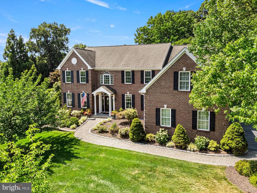 Nestled in the desirable Whiteland Ridge subdivision, this stunning Colonial-style residence offers an impressive blend of elegance and functionality. Spanning 5,960 square feet, this meticulously maintained home features five spacious bedrooms and four and a half bathrooms, ensuring ample space for both relaxation and entertainment. Step inside to discover a thoughtfully designed interior that caters to modern living. The heart of the home is the expansive kitchen, complete with a central island and generous table space, perfect for culinary enthusiasts and casual dining alike. A walk-in pantry provides additional storage, keeping your kitchen organized and clutter-free. The inviting living area boasts a cozy gas fireplace, creating a warm ambiance for gatherings or quiet evenings at home. The luxurious master suite features a walk-in closet, offering a private retreat with ample storage. Each additional bedroom is generously sized, providing comfort and privacy for all. The partially finished basement adds versatility, ideal for a workshop or recreational space, while the daylight windows ensure a bright and airy atmosphere. Outside, the property sits on a spacious 0.56-acre lot, complemented by an attached three-car garage and an asphalt driveway with room for eight additional vehicles. Energy efficiency is enhanced with owned PV solar arrays, contributing to sustainable living. This exceptional home combines classic charm with modern amenities, making it a perfect choice for those seeking a refined lifestyle in a tranquil setting.