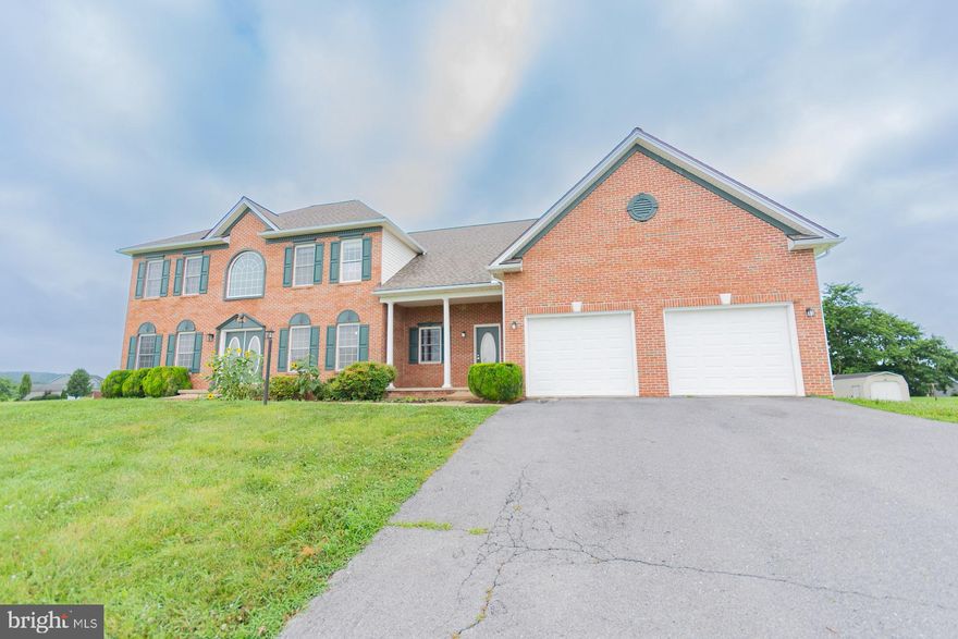 Ready to fall in love with your dream home? Let’s go!  Welcome to this stunning, turn-key gem in the desirable North Ridge Subdivision! Boasting 4 spacious bedrooms, 4 full baths, 2 half baths, and over 4,100 finished square feet, this home checks all the boxes—and then some! Plus, you’ve got an unfin­ished 2,088 sq ft lower level ready for your custom touch.  The choice is yours!  Sitting pretty on a 1.60-acre corner lot, this well-maintained beauty has had a glow-up—brand-new roof, fresh paint throughout, new LVP and carpet flooring, hardwood accents, updated kitchen with granite countertops, and new appliances! Every bathroom features a brand-new lavatory for that fresh, modern feel.  The main level is built to impress with a welcoming foyer, private office with built-ins, formal dining room, and a gourmet kitchen loaded with a double wall oven, electric cooktop, island, and sleek appliances. Enjoy cozy nights in the formal living room with gas fireplace, or kick back in the oversized family room. Two half baths and a laundry room with utility sink round out the main floor.  Take your pick—dual staircases lead to the upper level with a luxurious primary suite, sitting area, spa-like bath, and walk-in closet. Each additional bedroom has its own bath and walk-in closet—talk about space and privacy!  Outside, enjoy a covered porch, multiple decks, a 2-car garage, and a paved driveway. With easy access to I-81/I-70 and close to schools, shopping, and medical facilities, this location is a winner.  Schedule your private tour today! You don’t want to miss this one!