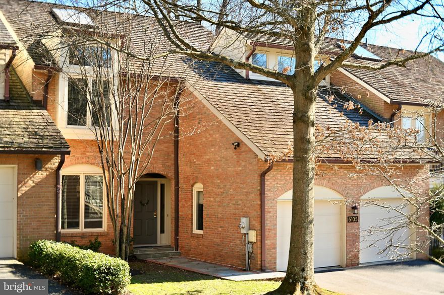 OFFERS IF ANY BY 2 PM ON SUNDAY,  FEBRUARY 25TH. This stunning Bethesda townhouse feels like a detached home, with large rooms, soaring ceilings, tons of light, gleaming hardwood floors throughout. The two-story living room boasts an oversized arched window offering views of treed space from the elevated position of the property, and a wood-burning fireplace. The  highlight of this home is the completely renovated upscale chef’s kitchen with slick custom cabinetry, butlers pantry, custom lighting, quartz countertops, professional gas cooktop, farmhouse sink, exhaust hood and more.  Also on the  main level are the large dining room with access to deck; office/library with built-ins and a wet bar, delightful outside balcony,  powder room and two-car garage.  The upstairs master bedroom offers two walk-in closets and a large en-suite bath with separate shower and whirlpool tub, double sinks and a skylight. On the same floor are two additional nice-size bedrooms and a second full bath. The lower level has an impressively huge light-filled recreation room with a fireplace, extra-high ceiling and a wall of glass doors to outside private patio and a fully-fenced back yard.  Another full bath, a 4th bedroom and a den complete the lower level. This quiet and well cared for community is located close to River Road, MacArthur Blvd, Clara Barton Pkwy, 495,  downtown Bethesda and D.C.
