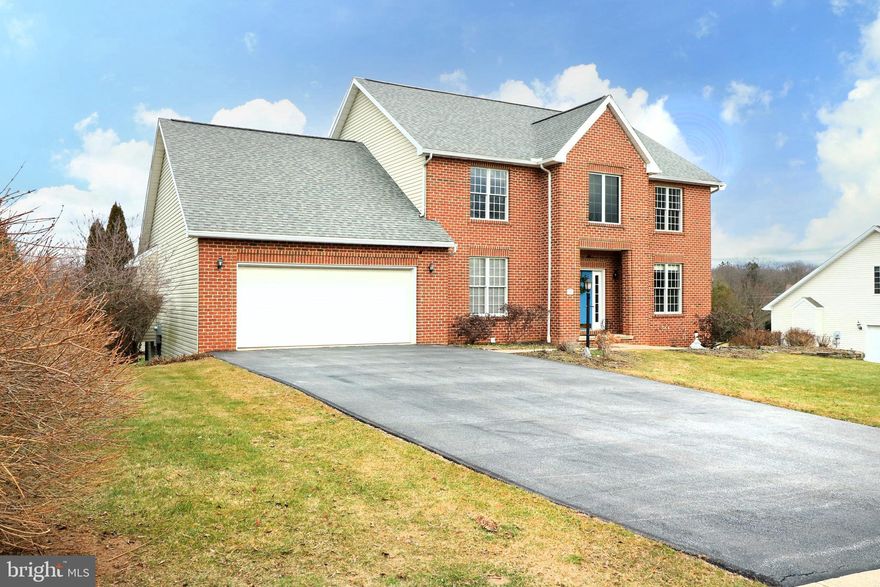 COR COMP PURPOSES ONLY. Lovely 2-story brick home in Teaberry Ridge. Hardwood floors, 4 beds up, 1 bed in lower-level, vaulted primary suite, finished walk-out lower-level, main floor office and 2-story foyer!