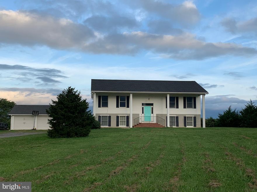 Well maintained 4 bedroom, 2 bath Split Foyer, Gas Fireplace, 2 car detached garage, 1 garage space in basement, New Roof in 2020. Fresh paint, New Vinyl floors, Gas Furnace fairly new, Mountain & Pastoral Views, back deck, close to Stanardsville.