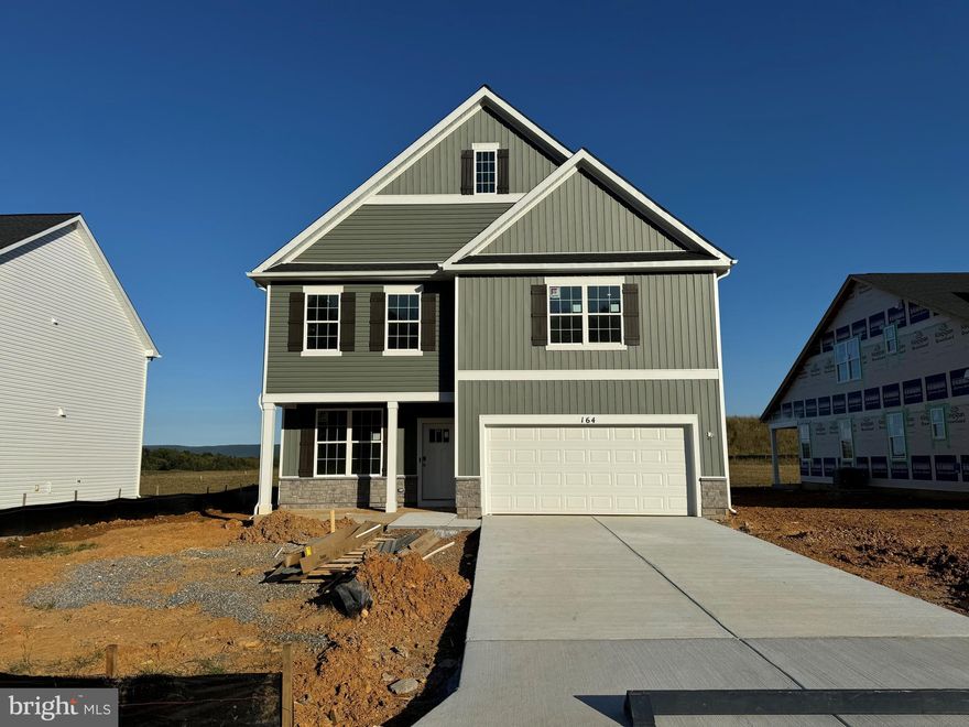 IMMEDIATE DELIVERY! Come see this 4 bedroom, 2.5 baths, with a generous 2 car garage, Fully equipped gourmet kitchen with stainless steel appliances, 25 cu ft side by side refrigerator with in door water/ice, multi cycle dishwasher, disposal, range and microwave with Aristokraft kitchen cabinetry, LED work area kitchen lighting and quartz countertops. Large island with sink. America's "Smart Home Technology" featuring Quisys IQ HD touchscreen with camera, Wi-Fi video doorbell, Echo Dot speaker with Alexa, Z-Wave programmable thermostat, smart light switch available and Keyless Entry front door lock with deadbolt, flat screen prewires with cat-6 outlets in primary bedroom and living area, and finally a Wi-Fi enabled garage door opener. LVP flooring on main level, two panel interior doors with brushed nickel hardware, wall to wall carpeting in bedrooms, ceiling fan pre-wires. Contact us today for your tour!!