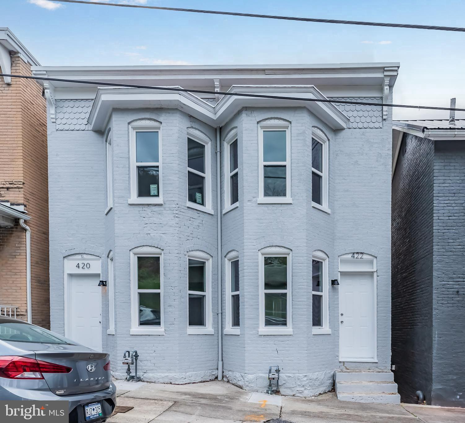 Welcome to 420-422 Walnut Street! This stunning, all brick duplex that has been completely remodeled from top to bottom! Everything is brand new—heating and cooling, bathrooms, kitchen, appliances, fireplace, deck, and flooring. It’s a true transformation! MOVE IN READY! Both units are currently rented for an immediate investment return! Come check it out today!