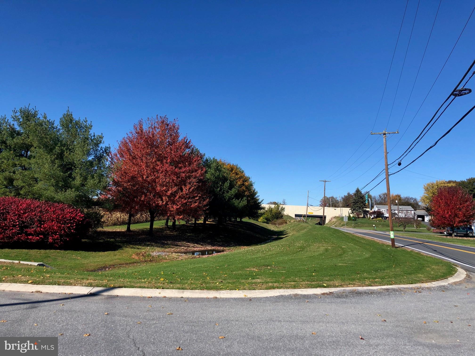Ideal site for many possible uses (zoned light industrial) including, but not limited to, limited manufacturing, assembly or packaging of electronics, wood working, metal products, printing, apparel products, instruments and medical produts. Also permitted is warehousing, laundry services and offices.  The property is located very near to PA Turnpike Interchange and Interstate I-81. Land abuts PA Turnpike and contains 5.79 acres more or less.